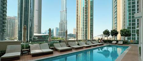 Outdoor pool, free cabanas, pool umbrellas