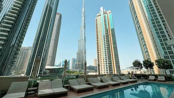 Outdoor pool, free cabanas, pool umbrellas