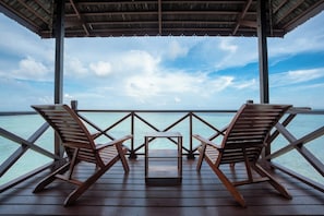 Habitación Deluxe, vista al océano | Terraza o patio