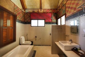 Deluxe Room, Ocean View, Beachside | Bathroom | Separate bathtub and shower, free toiletries, hair dryer, bathrobes