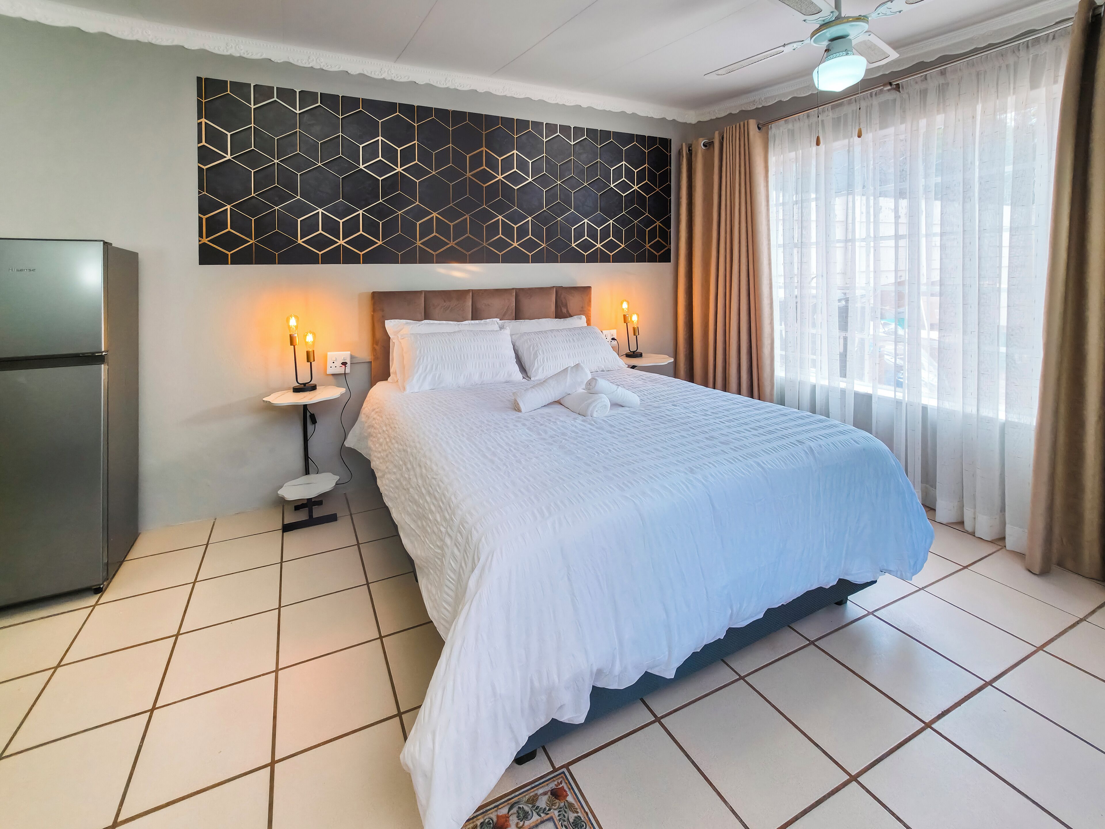 Superior Studio Suite, Garden View | Bathroom | Shower, towels, toilet paper