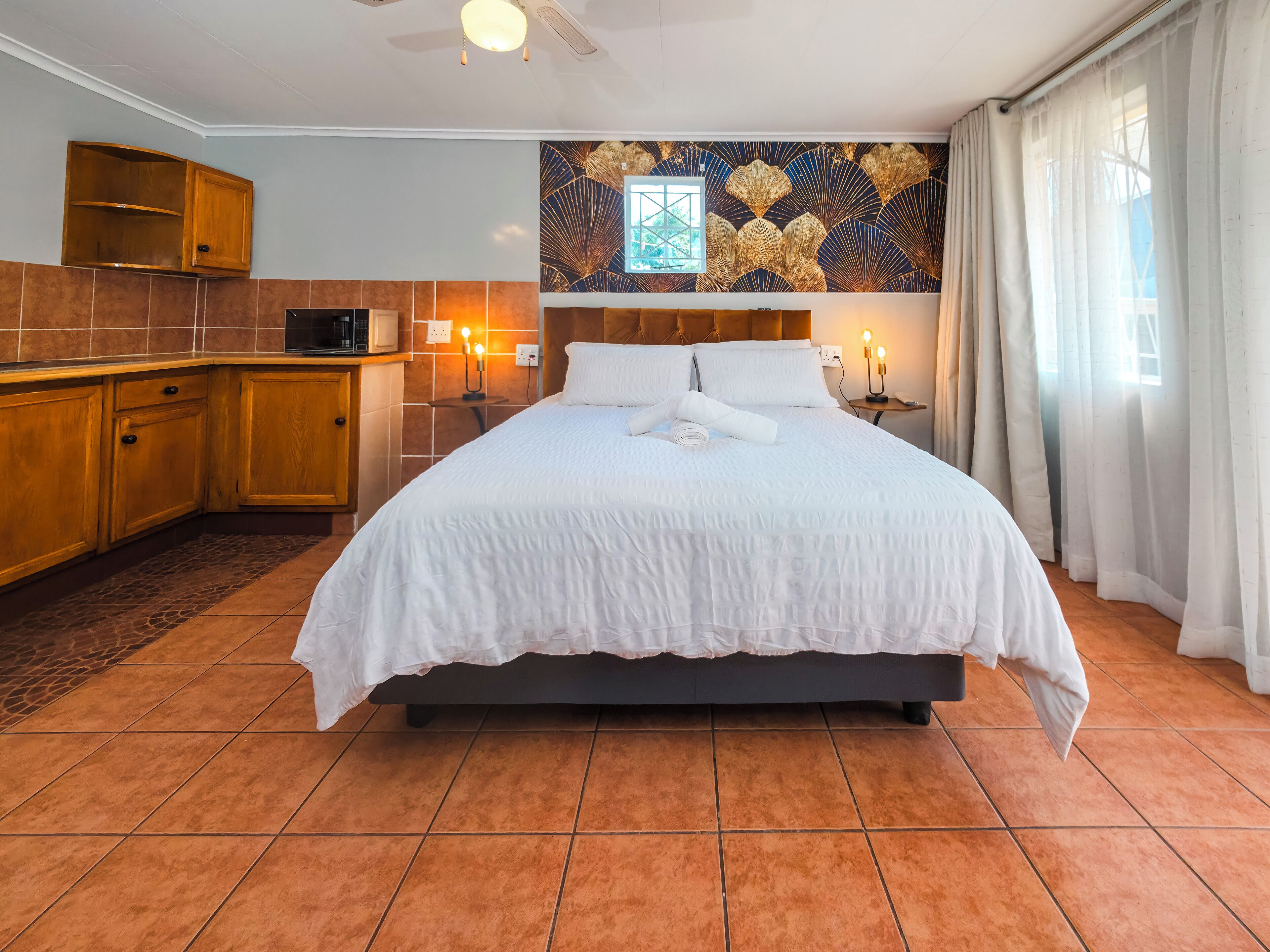 Habitación cuádruple superior, vista al jardín | Cortinas blackout, tabla de planchar con plancha y wifi gratis 