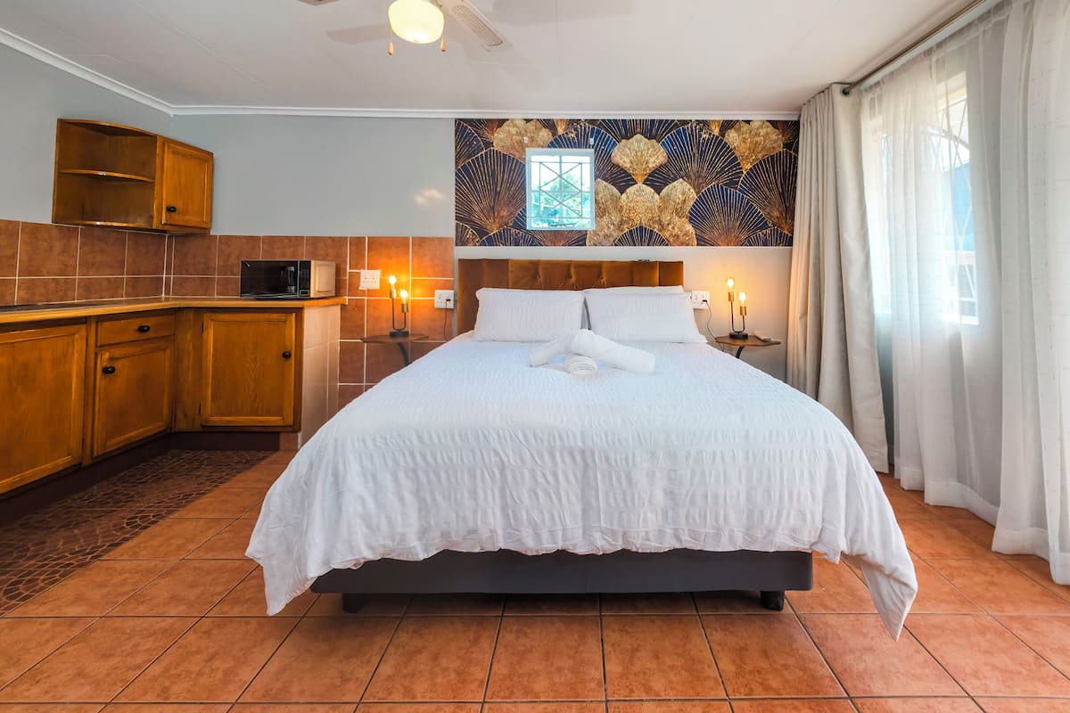 Superior Quadruple Room, Garden View | Egyptian cotton sheets, premium bedding, minibar, blackout drapes