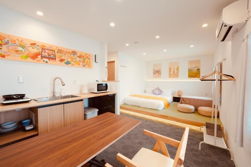 Deluxe Condo, Non Smoking, Kitchen | Living area | Toys