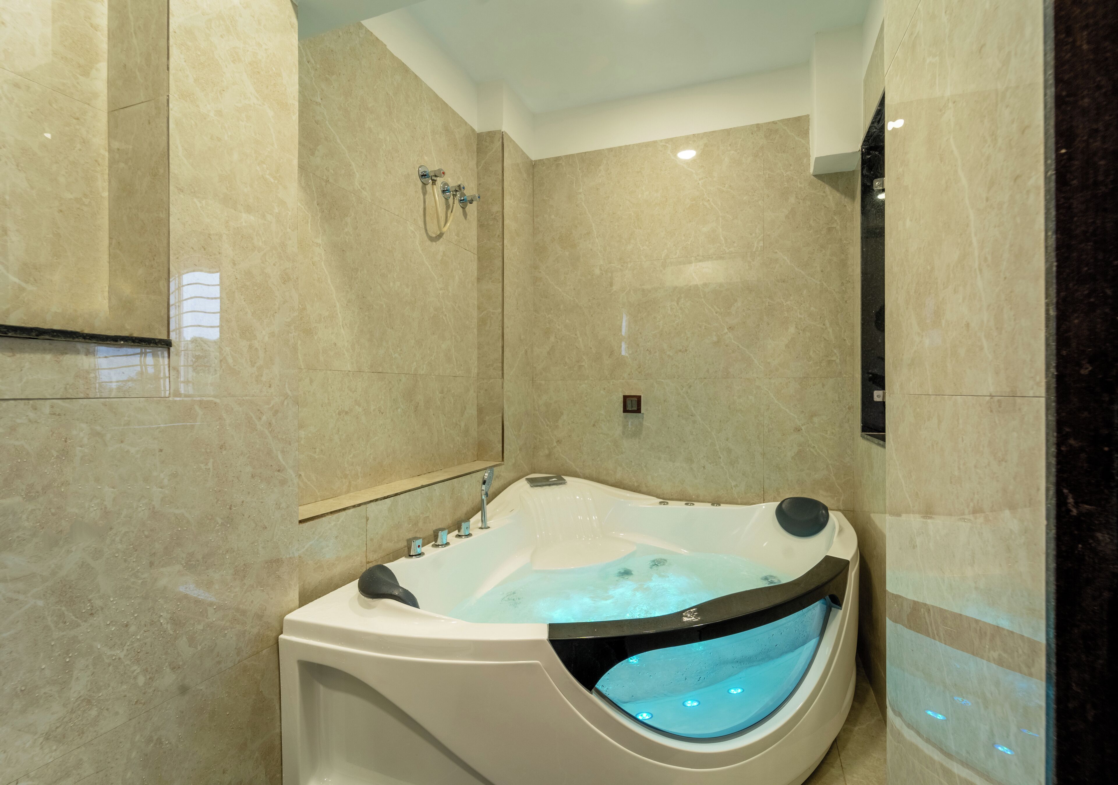 Separate tub and shower, towels, soap, shampoo