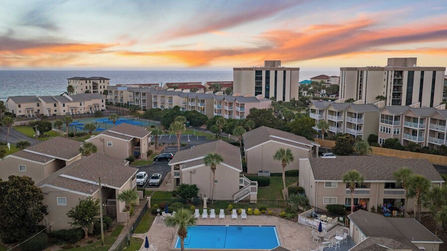 Steps From the Sand Bright Coastal Stay w/ Pool Access Coastal Hideaway by Avantstay