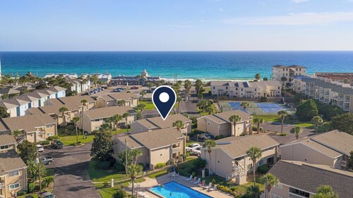 Steps From the Sand Bright Coastal Stay w/ Pool Access Coastal Hideaway by Avantstay