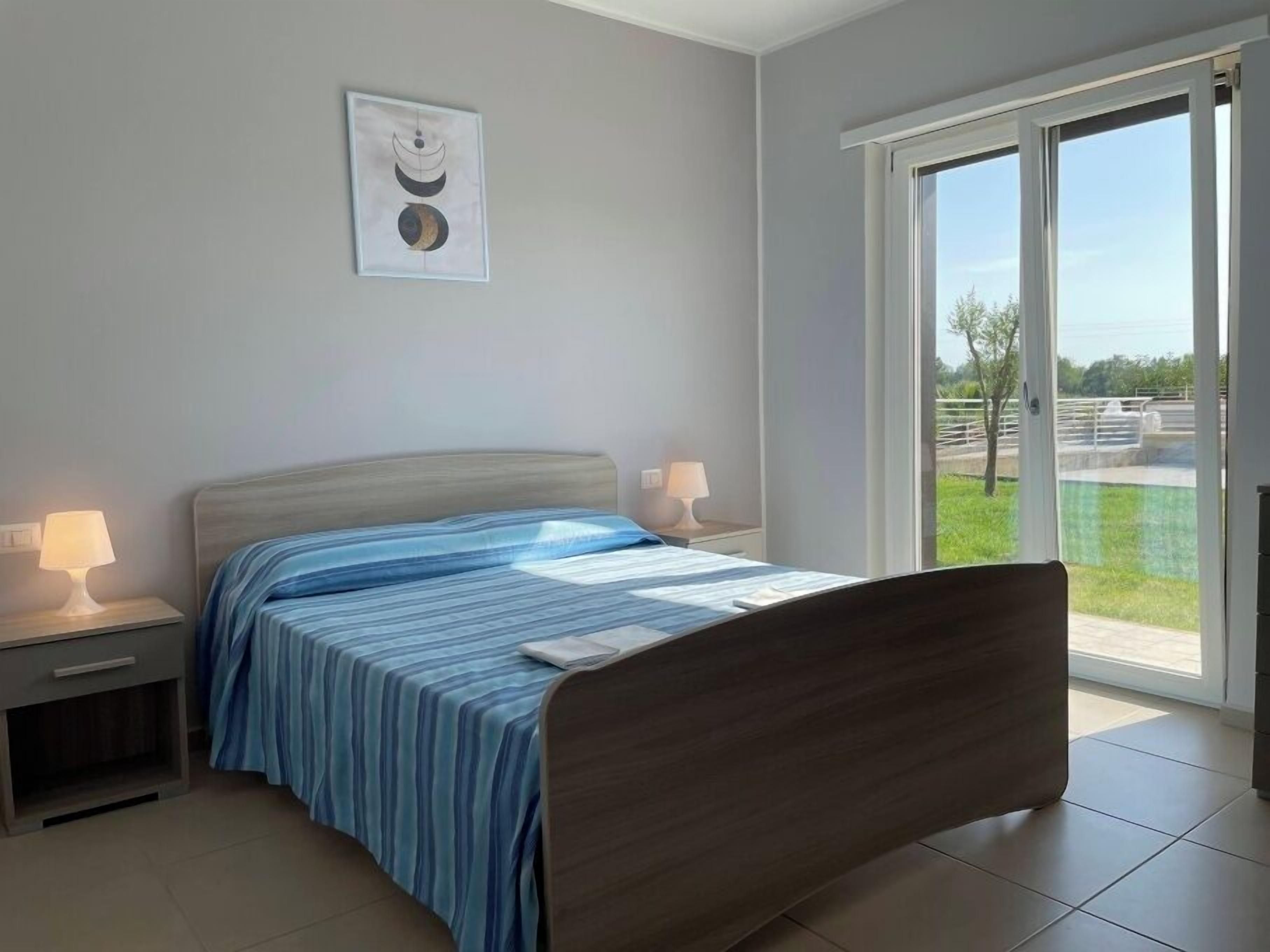 Appartement Deluxe, patio, vue jardin | Bureau, rideaux occultants, Wi-Fi gratuit