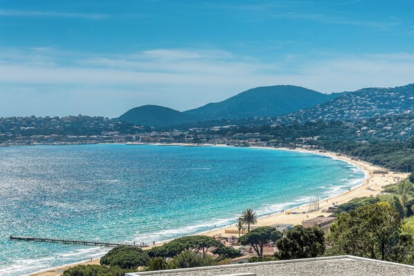 On the beach, sun-loungers, beach towels