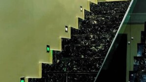 A staircase with a marble finish and green emergency exit signs. - 6BDR Duplex in GRA Near Shoprite & Malls (Enugu)