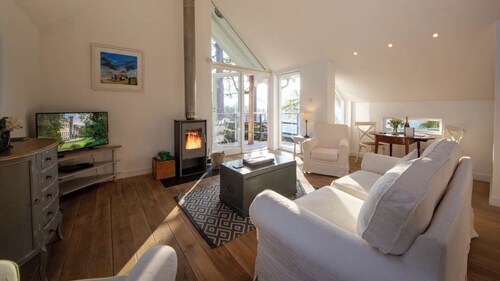 Luxury waterfall cottage with private hot tub at Loch  Tay