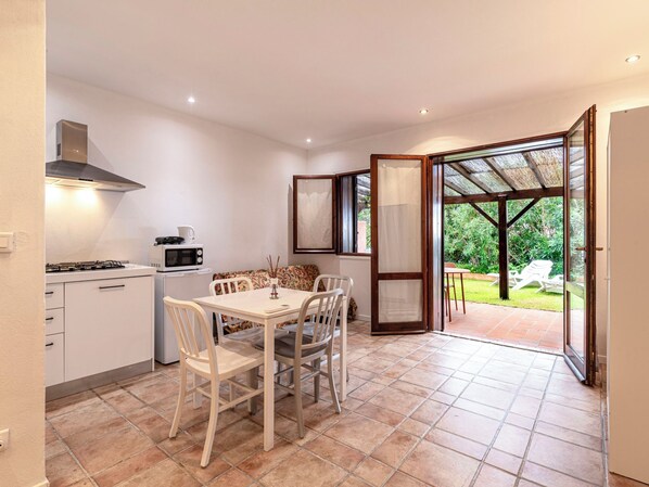 Fridge, microwave, cookware/dishes/utensils