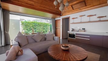 Luxury Villa, Beach View | Living area | 32-inch flat-screen TV with cable channels