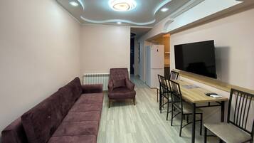 50-inch flat-screen TV with cable channels