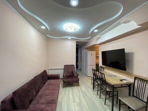 50-inch flat-screen TV with cable channels