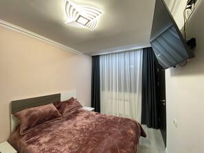 Blackout curtains, iron/ironing board, free WiFi