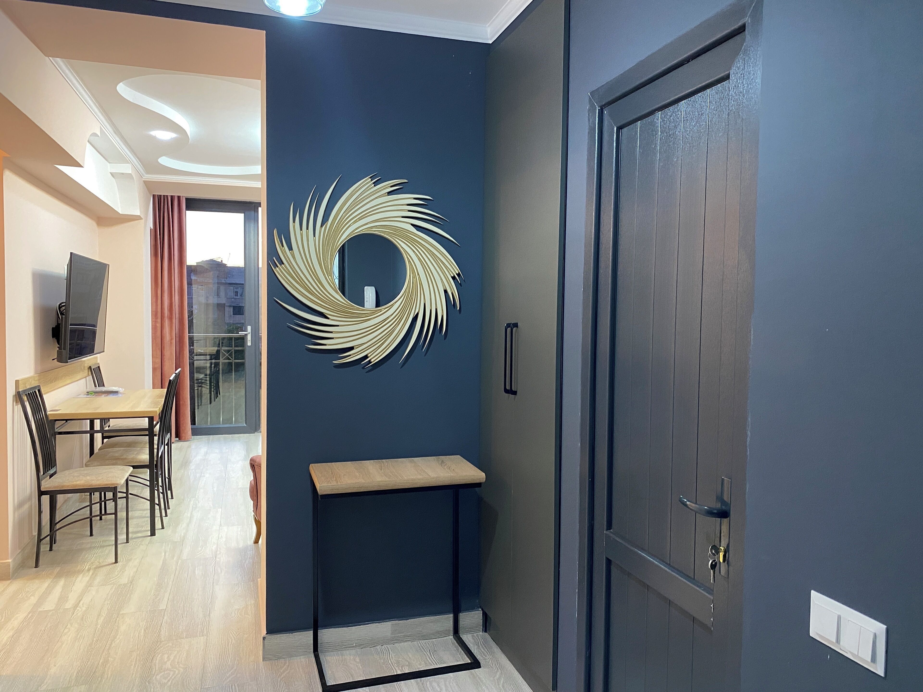 Standard Apartment, Balcony | Living area | 50-inch flat-screen TV with cable channels