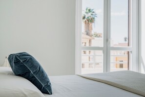 1 غرفة نوم ومكواة/لوح كي وملاءات أسرّة