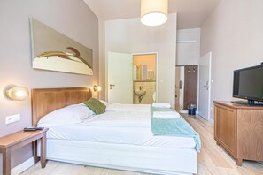 1 habitación, tabla de planchar con plancha, wifi y ropa de cama 