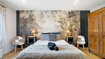 1 slaapkamer, een strijkplank/strijkijzer, wifi, beddengoed