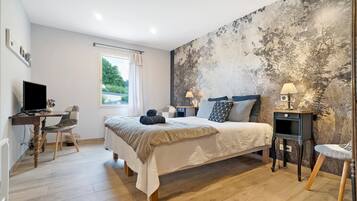 1 slaapkamer, een strijkplank/strijkijzer, wifi, beddengoed