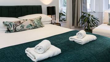 1 bedroom, desk, iron/ironing board, travel crib