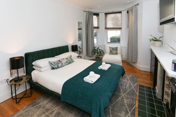 1 bedroom, desk, iron/ironing board, travel cot