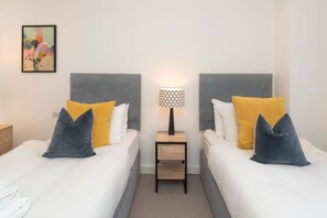 2 bedrooms, desk, iron/ironing board, travel cot
