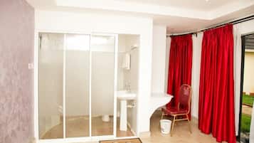 Deluxe Double Room, Garden View | Bathroom | Shower, slippers, towels, soap