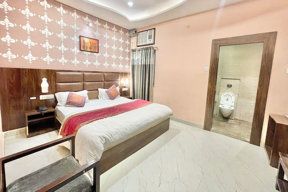 Premium bedding, desk, laptop workspace, soundproofing