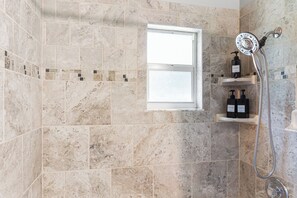 Shower, hair dryer, towels, soap