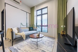 Deluxe Suite, 2 Bedrooms, Non Smoking | Living area
