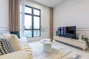 Suite Deluxe, 2 chambres, non-fumeur | Coin séjour
