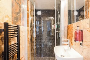 Apartment, City View | Bathroom | Shower, rainfall showerhead, eco-friendly toiletries, hair dryer - Merveil Luxury Suite - Saint Louis (Paris)