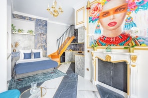Apartment, City View | Living area | 43-inch Smart TV with cable channels, Netflix, streaming services - Merveil Luxury Suite - Saint Louis (Paris)