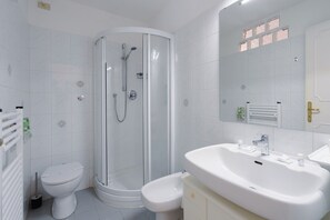 Hair dryer, bidet, towels, soap