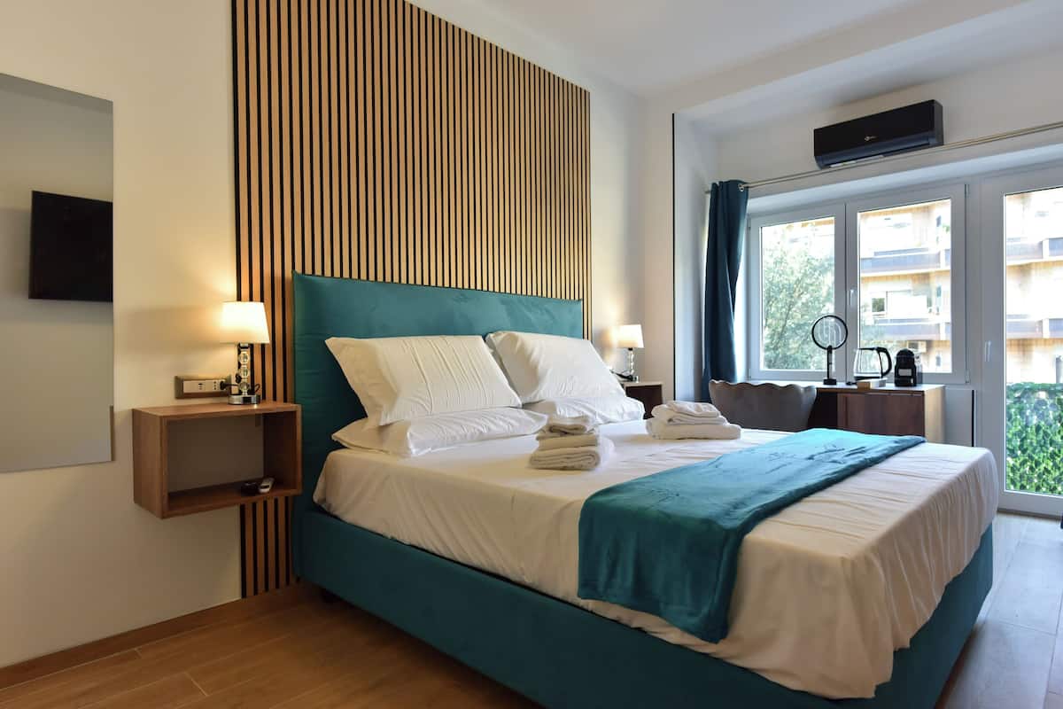 Deluxe Double Room | In-room safe, desk, laptop workspace, blackout drapes