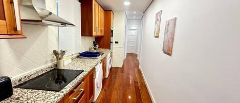 Fridge, microwave, stovetop, cookware/dishes/utensils