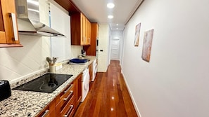Fridge, microwave, stovetop, cookware/dishes/utensils