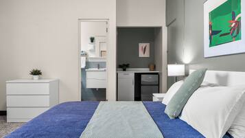 Iron/ironing board, travel crib, free WiFi, bed sheets