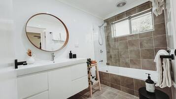 Shower, hair dryer, towels, soap