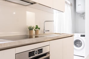 Apartment, 1 Queen Bed with Sofa bed | Private kitchen | Fridge, oven, stovetop, dishwasher