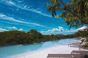 On the beach, beach towels - Laguna Beachfront 3BR Cozy Condo (Choeng Thale)