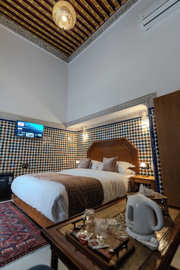 经典四人房, 庭院景观 | 客房内保险箱、遮光窗帘、免费 WiFi