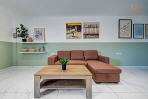 Apartamento, várias camas (MSC012) | Área de estar