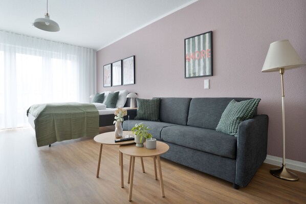 Suite Studio Deluxe, 1 grand lit et 1 canapé-lit | Coin séjour