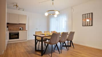 Family Apartment, 2 Bedrooms, Balcony | Private kitchen | Fridge, microwave, stovetop, cookware/dishes/utensils