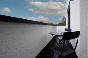 Suite estudio Deluxe, 1 cama Queen size y sofá cama | Balcón