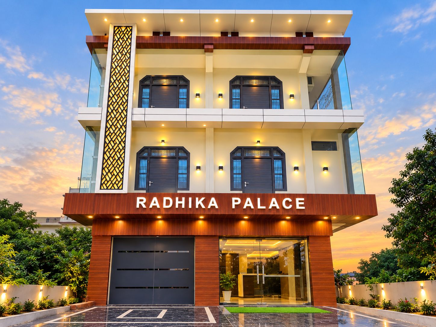 A multi-story building with a sign reading 'Radhika Palace' at the entrance.