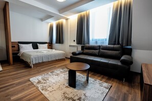 Desk, laptop workspace, blackout drapes, soundproofing